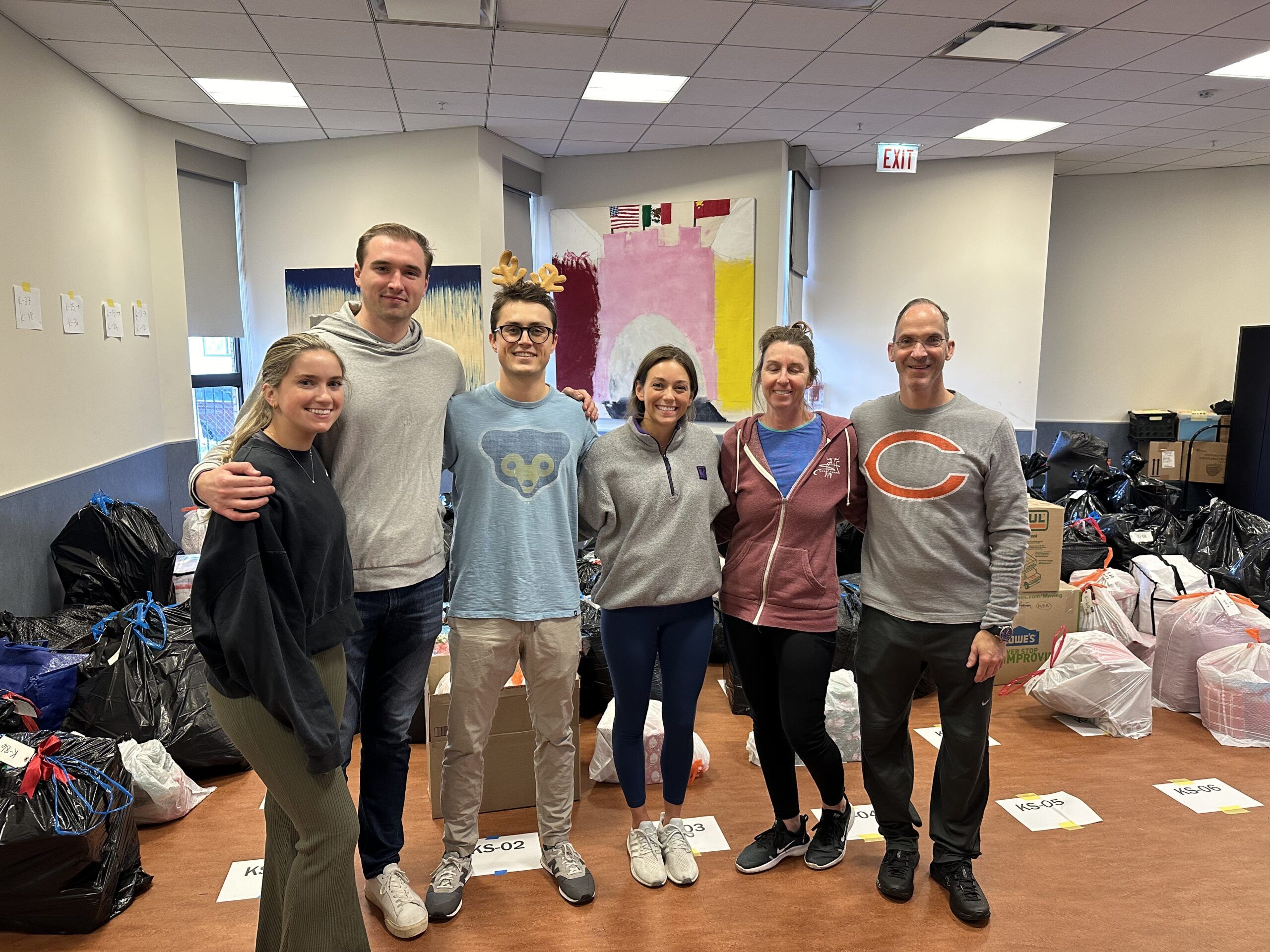 Family-to-Family Volunteers helping sort gifts
