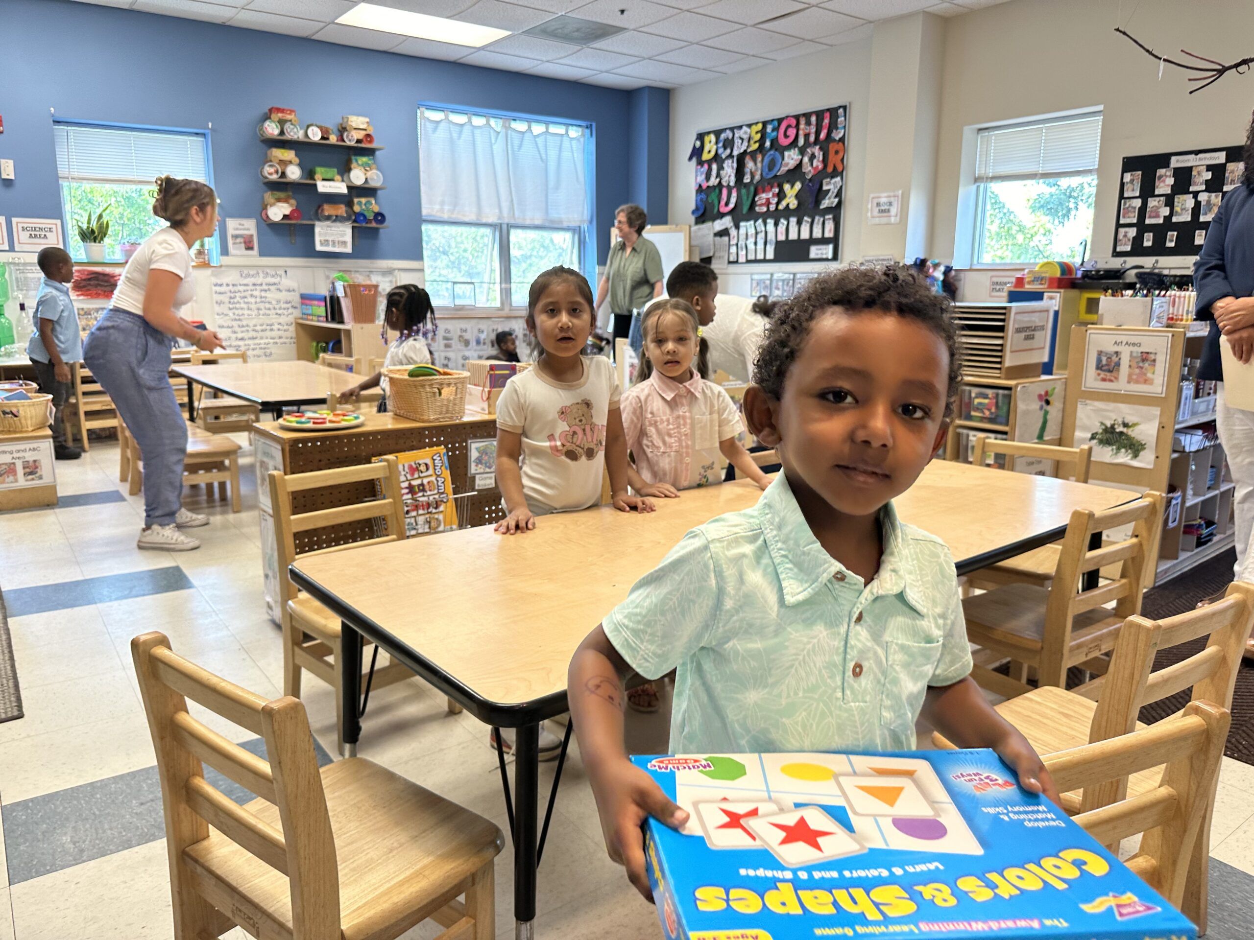 Family-to-Family Volunteers helping sort gifts